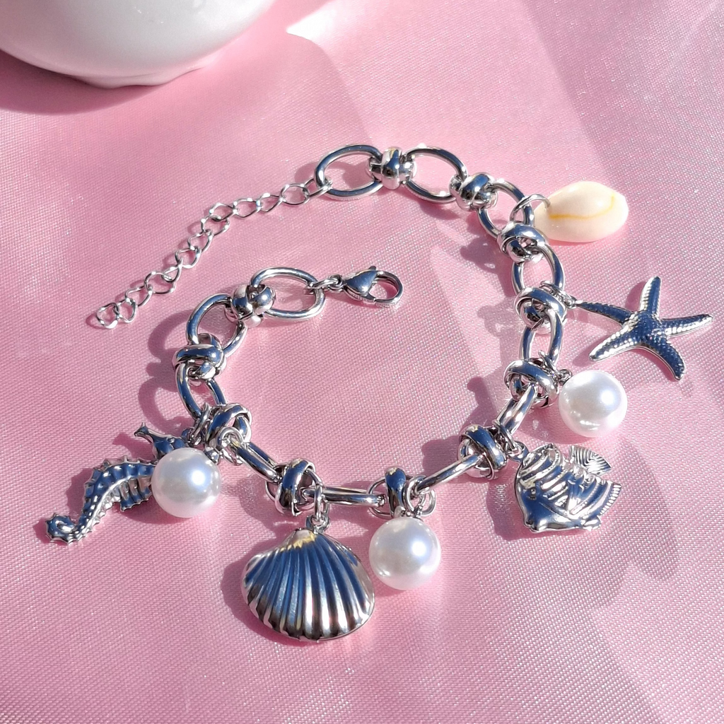 Le Bracelet argenté "SORAYA" à breloques