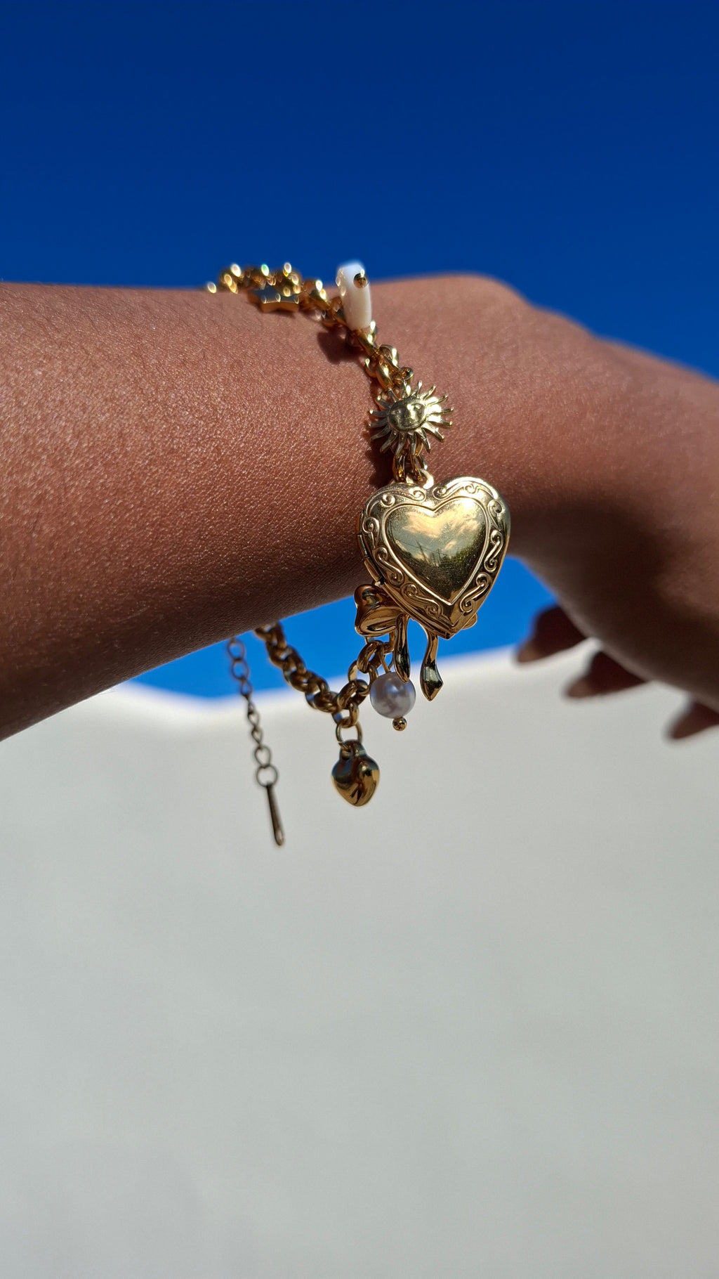 Le Bracelet breloques " MERVEILLE"